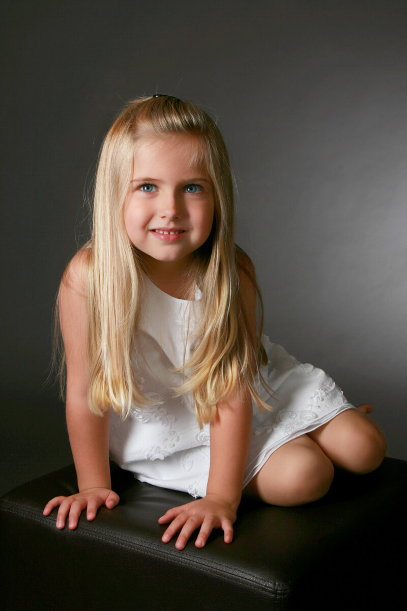 Young girl with blond hair for in studio portrait