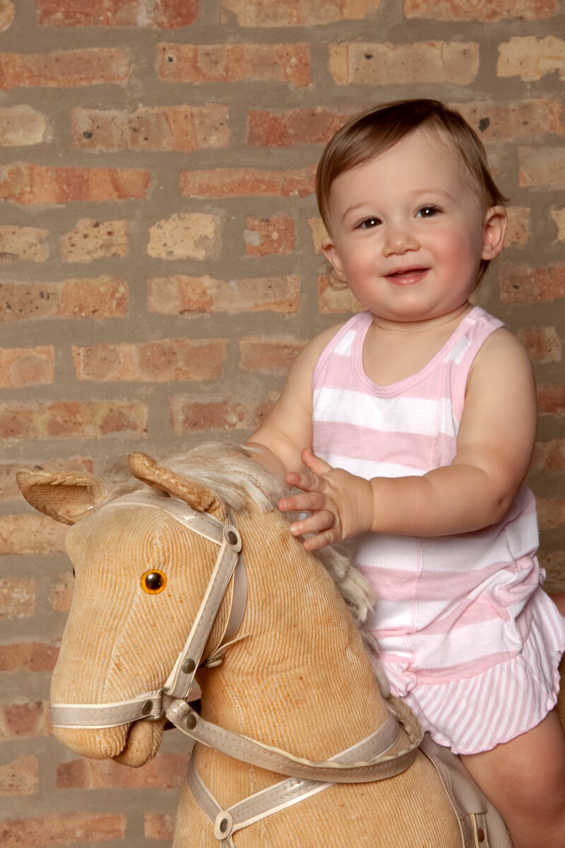 Rocking Horse Baby Portrait taken in studio