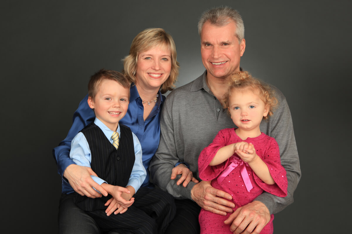 Family Portrait in Studio with grey backdrop