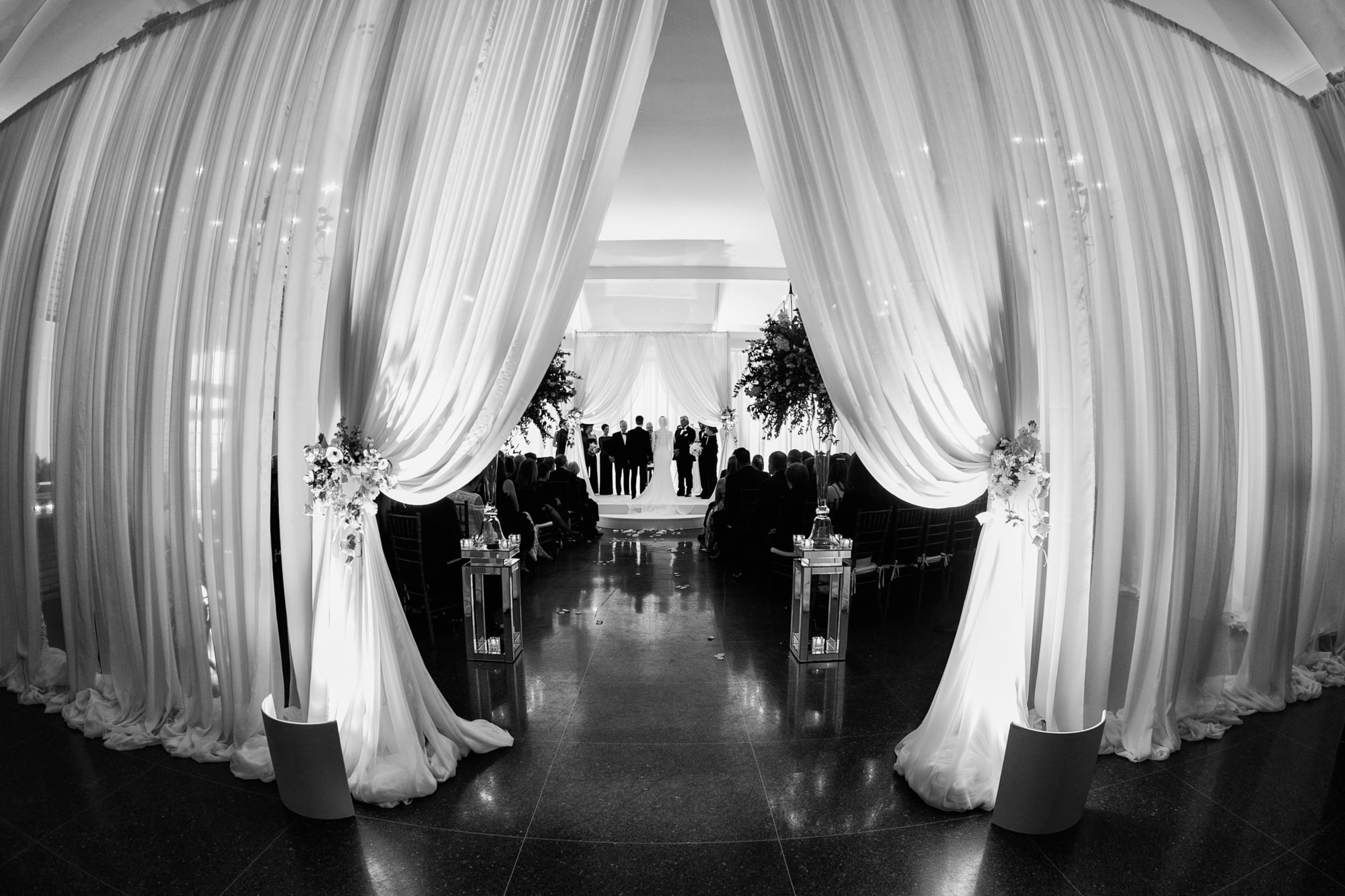 Dramatic black and white photo of wedding ceremony