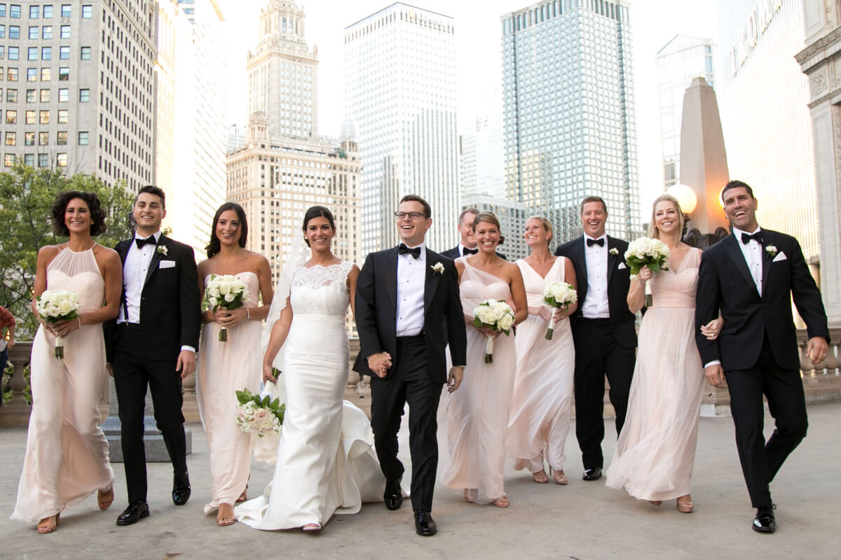 Candid walking photo of bridal party in Chicago