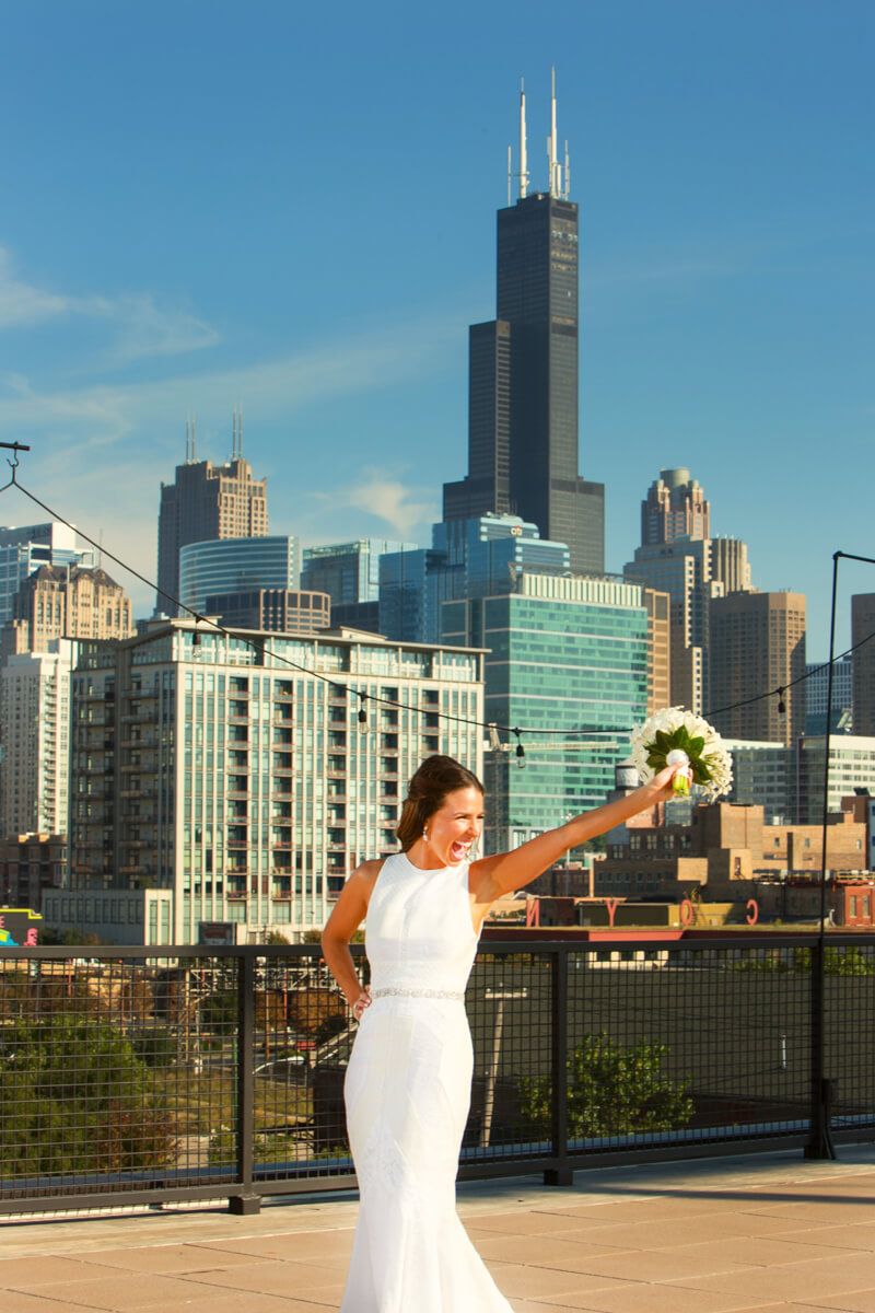 Candid bride in front of Chicago Skyline