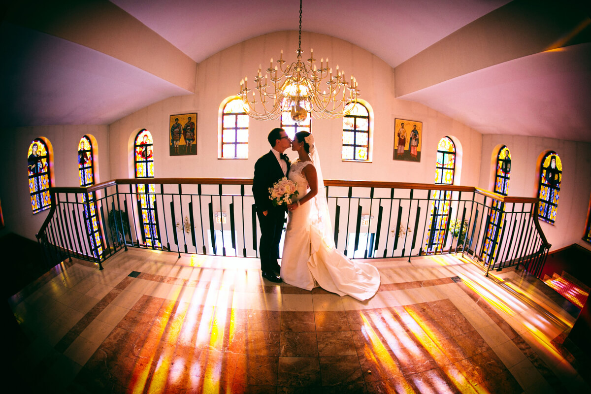 Stained Glass backdrop of bride and groom's portrait