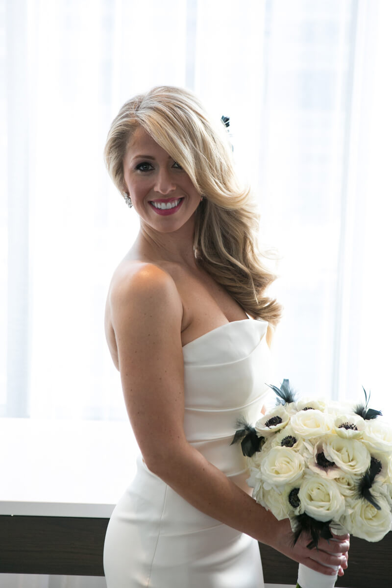 Bride poses with window light