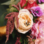 Colorful wedding bouquet and ring