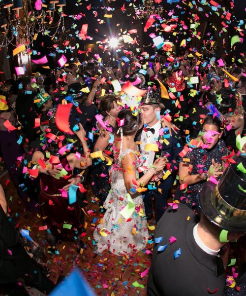 Confetti drop at wedding reception on New Years Eve